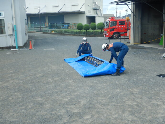 （写真）積載はしご利用工法訓練